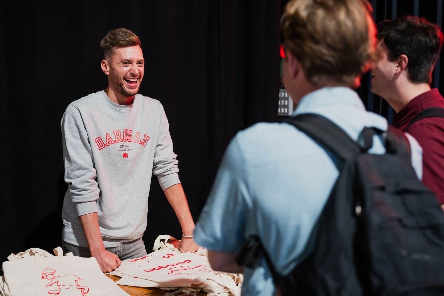 Employers laughing with students